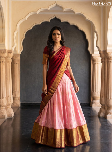 Pure kanchipuram silk lehenga dhawani mild peach pink and deep maroon with allover zari weaves and long rich zari woven border
