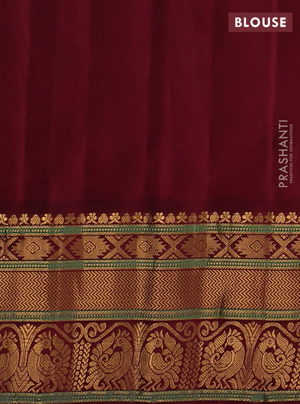 Pure gadwal silk saree dual shade of greenish purple and maroon with allover zari checks & buttas and zari woven border