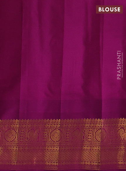 Pure gadwal silk saree dual shade of mustard yellow and purple with zari woven buttas and temple design zari woven border