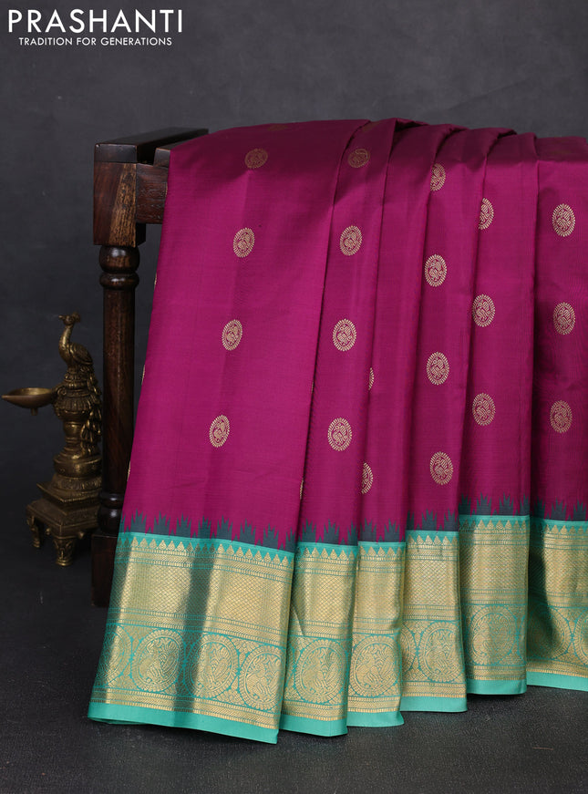 Pure gadwal silk saree purple and teal green with zari woven buttas and temple design zari woven border