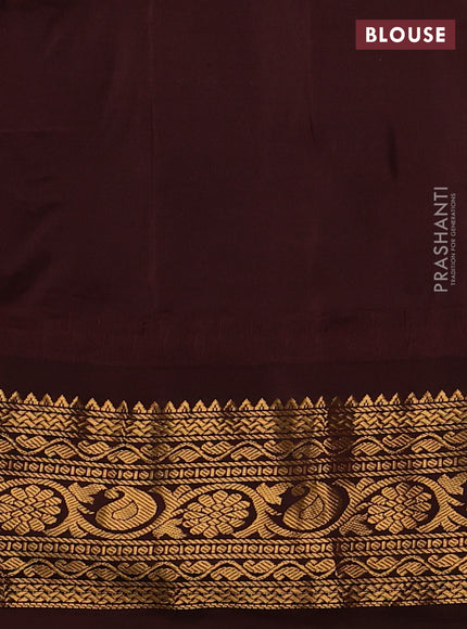 Pure gadwal silk saree dual shade of pink and coffee brown with allover zari strips & muniya buttas and temple design zari woven border