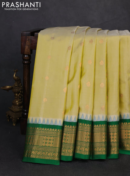 Pure gadwal silk saree pista green and green with zari woven buttas and temple design zari woven border