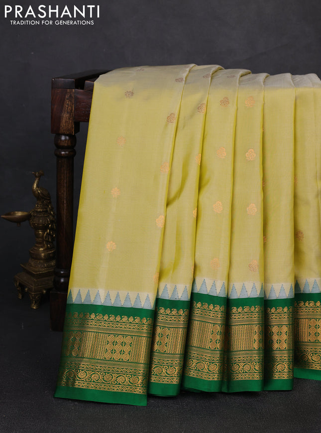 Pure gadwal silk saree pista green and green with zari woven buttas and temple design zari woven border