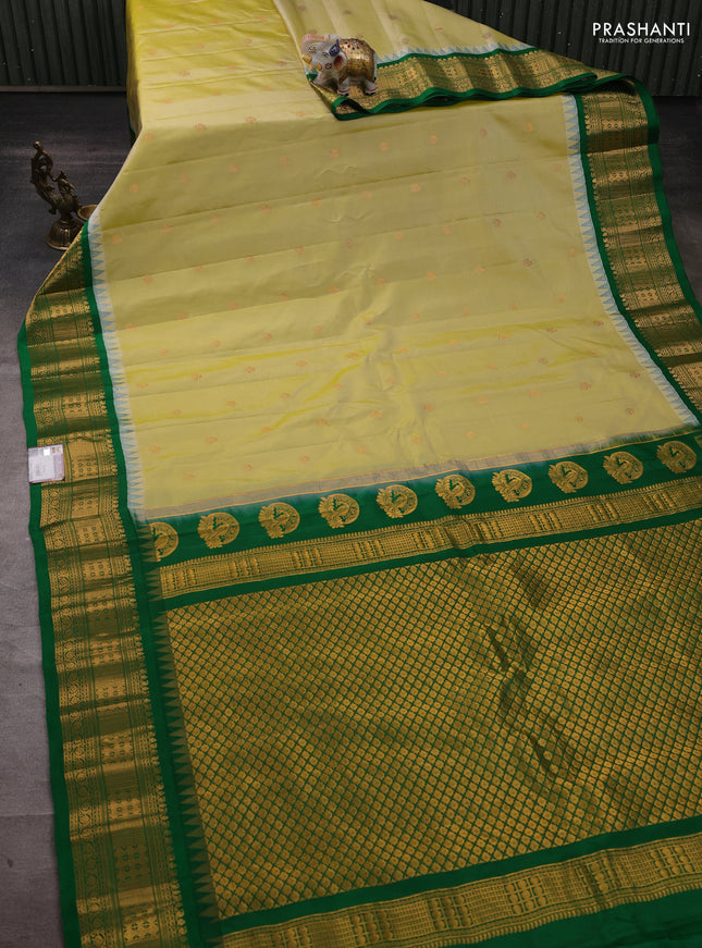 Pure gadwal silk saree pista green and green with zari woven buttas and temple design zari woven border