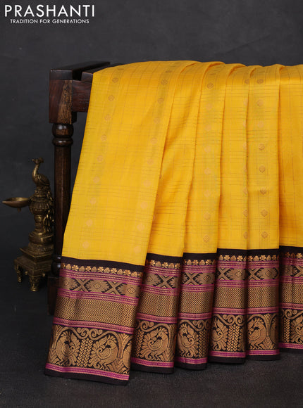 Pure gadwal silk saree yellow and black with allover zari checks & buttas and rich zari woven border