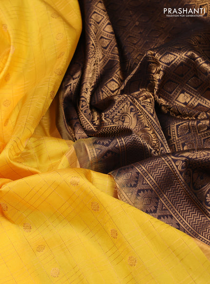 Pure gadwal silk saree yellow and black with allover zari checks & buttas and rich zari woven border