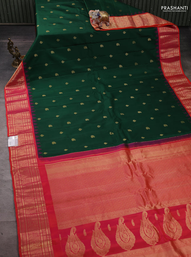 Pure gadwal silk saree bottle green and dual shade of pinkish orange with zari woven buttas and temple design zari woven border