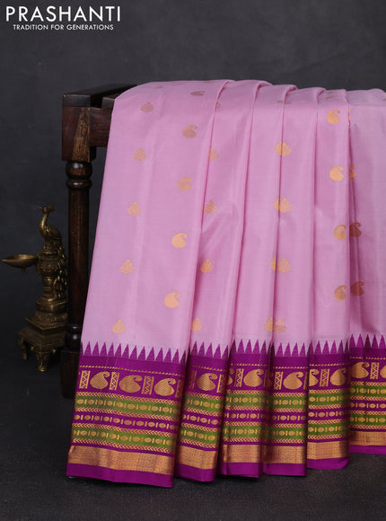 Pure gadwal silk saree mild lavender and purple with zari woven buttas and temple design zari woven border