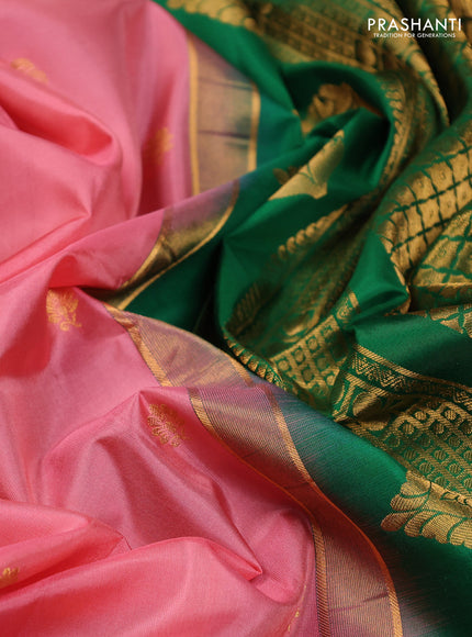 Pure gadwal silk saree peach shade and green with zari woven buttas and temple design zari woven border