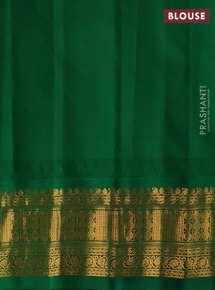 Pure gadwal silk saree peach shade and green with zari woven buttas and temple design zari woven border