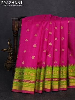 Pure gadwal silk saree magenta pink and light green with zari woven buttas and temple design zari woven border