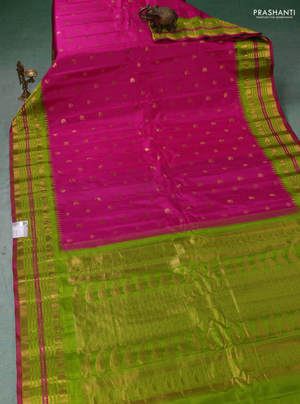 Pure gadwal silk saree magenta pink and light green with zari woven buttas and temple design zari woven border