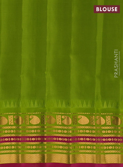 Pure gadwal silk saree magenta pink and light green with zari woven buttas and temple design zari woven border