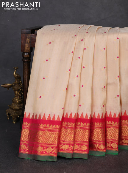Pure gadwal silk saree cream and pink with allover zari strips & buttas and temple design zari woven border