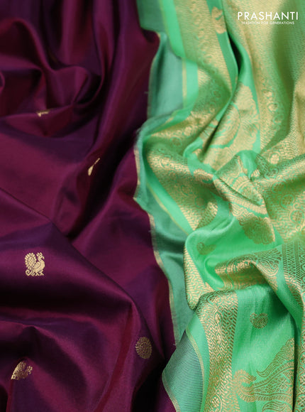 Pure gadwal silk saree deep purple and teal green with zari woven buttas and temple design zari woven border