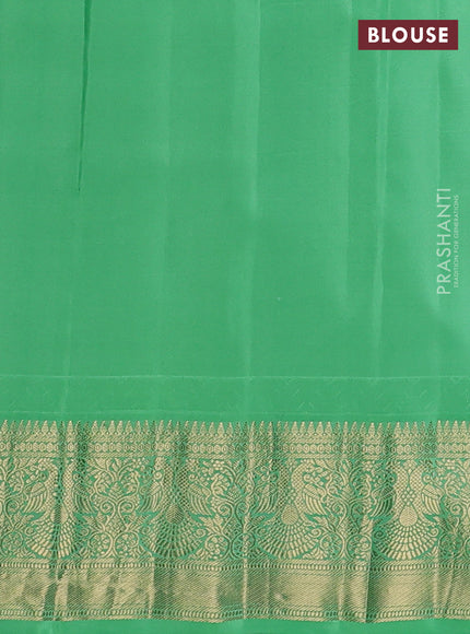 Pure gadwal silk saree deep purple and teal green with zari woven buttas and temple design zari woven border