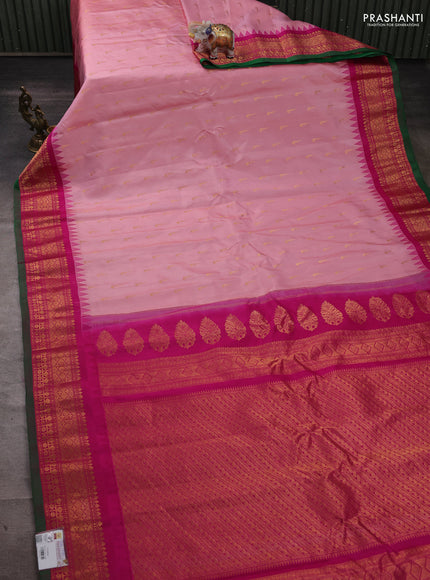 Pure gadwal silk saree mild peach and magenta pink with zari woven muniya buttas and temple design zari woven border