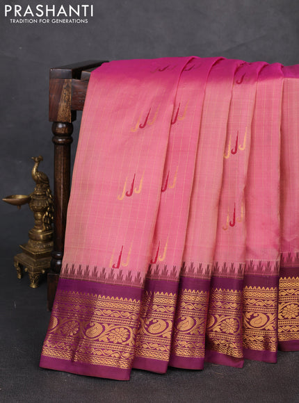 Pure gadwal silk saree dual shade of pink and purple with allover zari weaves & muniya buttas and temple design zari woven border
