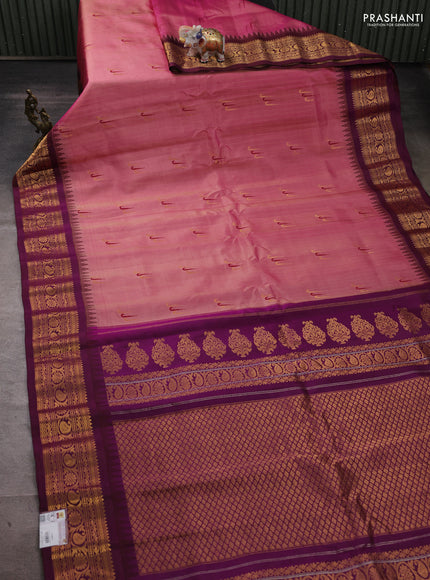 Pure gadwal silk saree dual shade of pink and purple with allover zari weaves & muniya buttas and temple design zari woven border