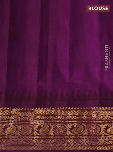 Pure gadwal silk saree dual shade of pink and purple with allover zari weaves & muniya buttas and temple design zari woven border