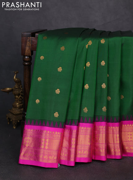 Pure gadwal silk saree bottle green and magenta pink with zari woven buttas and temple design zari woven border