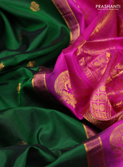 Pure gadwal silk saree bottle green and magenta pink with zari woven buttas and temple design zari woven border