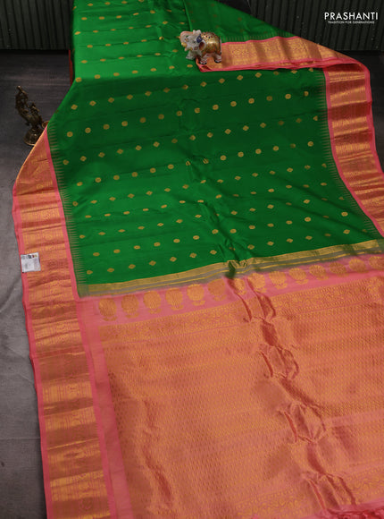 Pure gadwal silk saree green and peach shade with zari woven buttas and temple design zari woven border