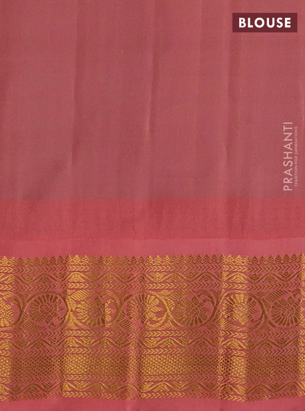 Pure gadwal silk saree green and peach shade with zari woven buttas and temple design zari woven border
