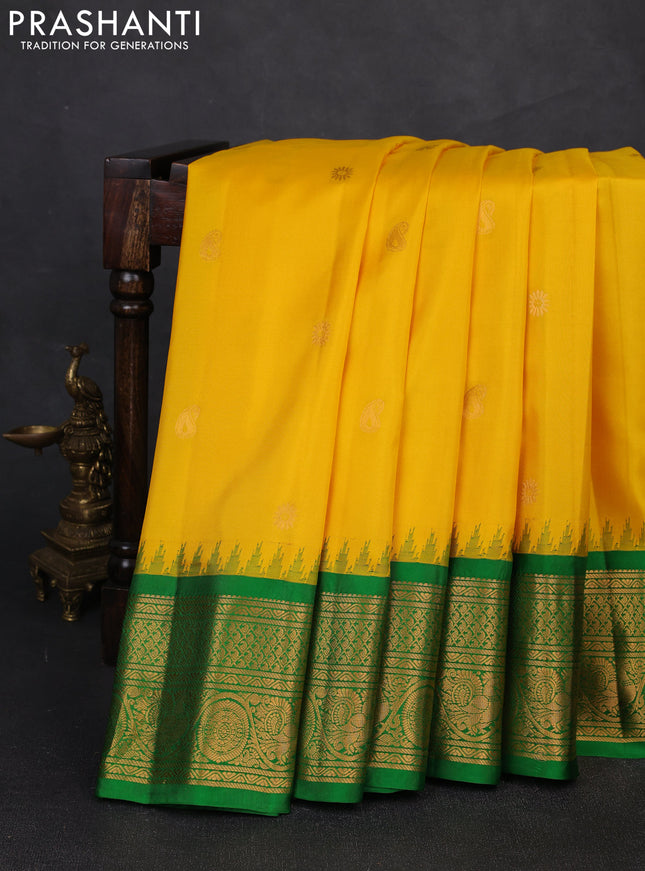 Pure gadwal silk saree yellow and green with zari woven buttas and temple design zari woven border