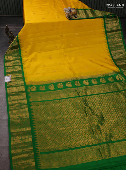 Pure gadwal silk saree yellow and green with zari woven buttas and temple design zari woven border