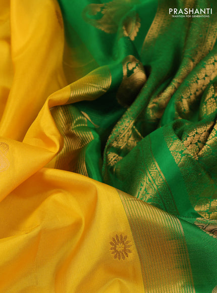Pure gadwal silk saree yellow and green with zari woven buttas and temple design zari woven border