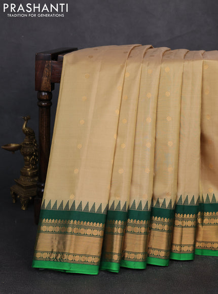 Pure gadwal silk saree elaichi green and green with zari woven buttas and temple design zari woven border