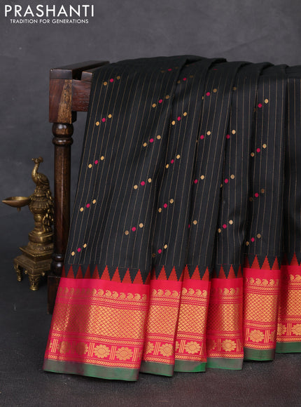 Pure gadwal silk saree black and pink with allover zari strips & buttas and temple design zari woven border