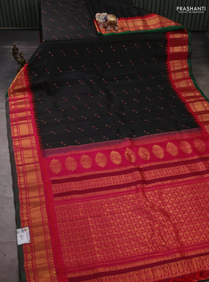 Pure gadwal silk saree black and pink with allover zari strips & buttas and temple design zari woven border