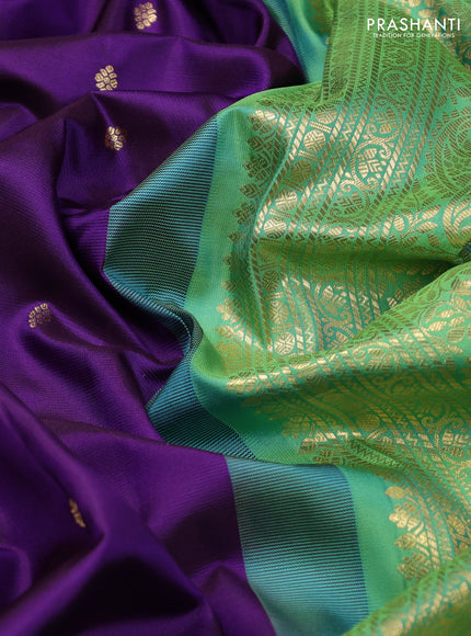 Pure gadwal silk saree purple and teal green shade with zari woven buttas and rich zari woven border