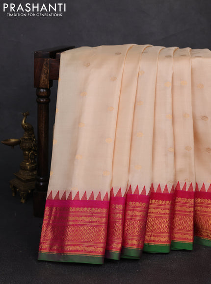 Pure gadwal silk saree off white and pink with zari woven buttas and temple design zari woven border