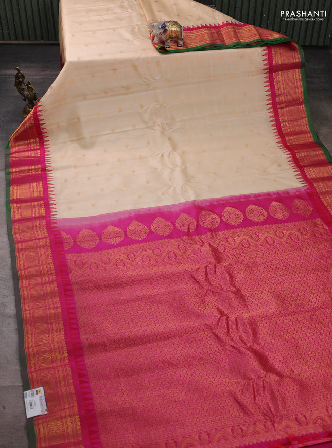 Pure gadwal silk saree off white and pink with zari woven buttas and temple design zari woven border