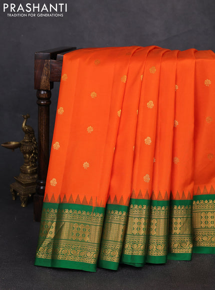 Pure gadwal silk saree orange and green with zari woven buttas and temple design zari woven border