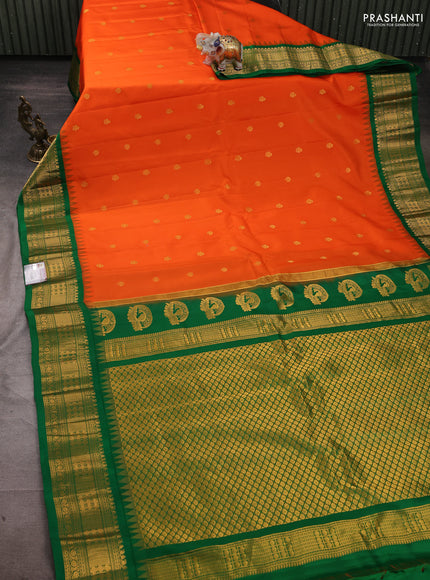 Pure gadwal silk saree orange and green with zari woven buttas and temple design zari woven border