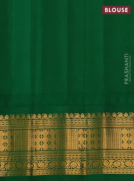 Pure gadwal silk saree orange and green with zari woven buttas and temple design zari woven border