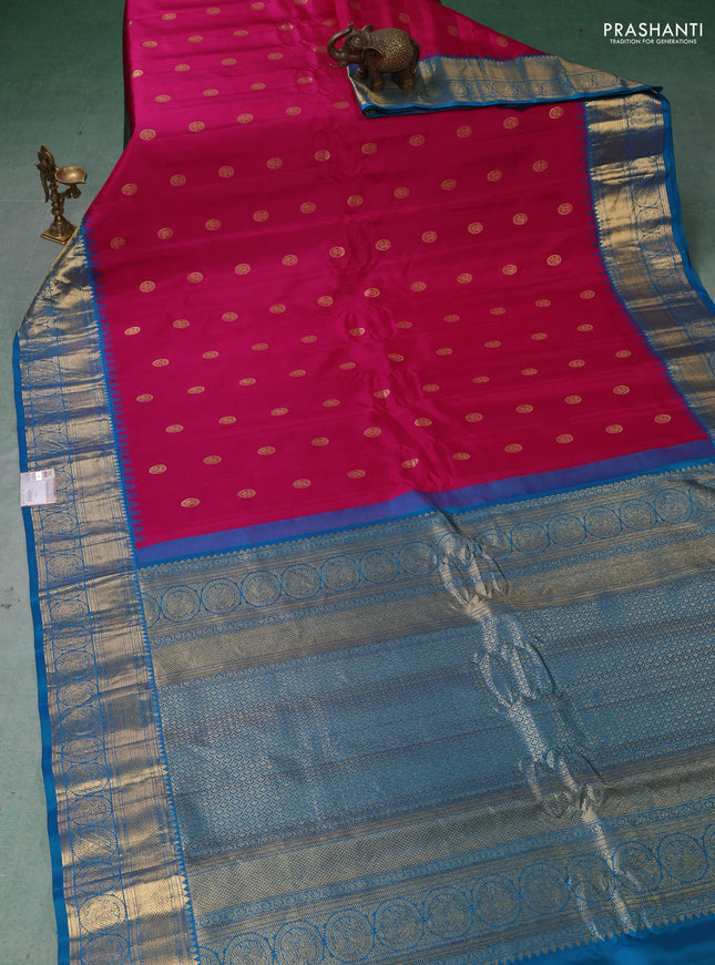 Pure gadwal silk saree magenta pink and cs blue with zari woven buttas and temple design zari woven border