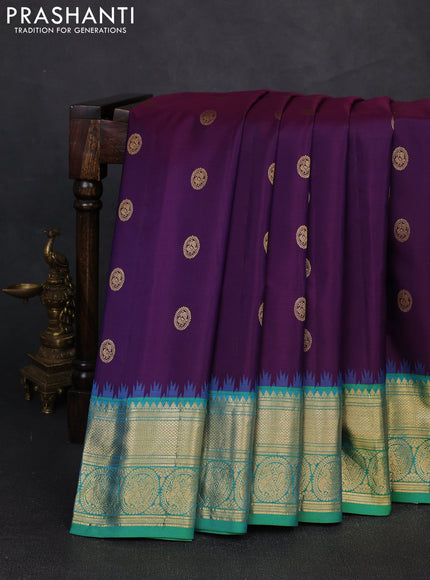 Pure gadwal silk saree deep purple and dual shade of teal green with zari woven buttas and temple design zari woven border