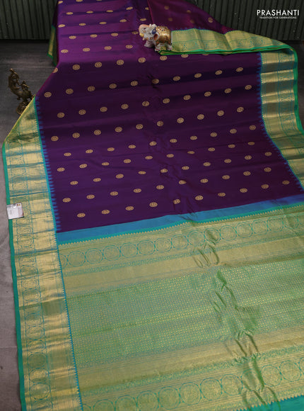 Pure gadwal silk saree deep purple and dual shade of teal green with zari woven buttas and temple design zari woven border
