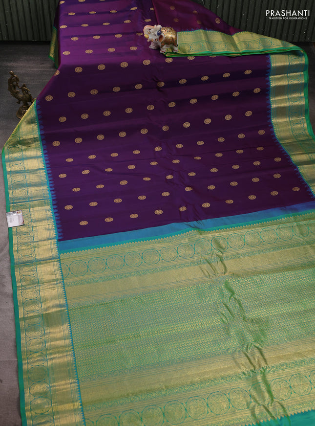 Pure gadwal silk saree deep purple and dual shade of teal green with zari woven buttas and temple design zari woven border