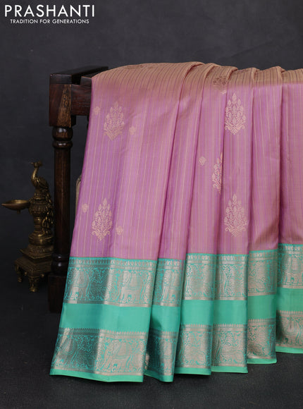 Pure gadwal silk saree pastel lavender and teal green shade with allover zari stripe pattern and rettapet zari woven border