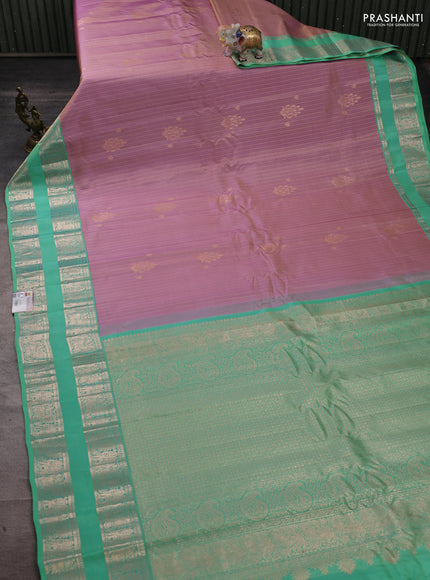 Pure gadwal silk saree pastel lavender and teal green shade with allover zari stripe pattern and rettapet zari woven border