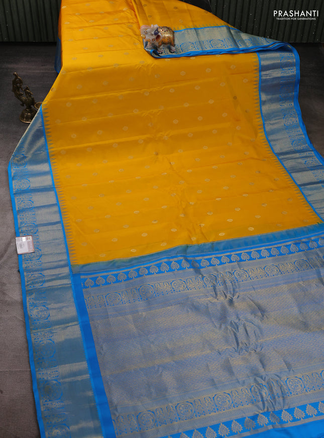 Pure gadwal silk saree yellow and cs blue with zari woven buttas and temple design zari woven border