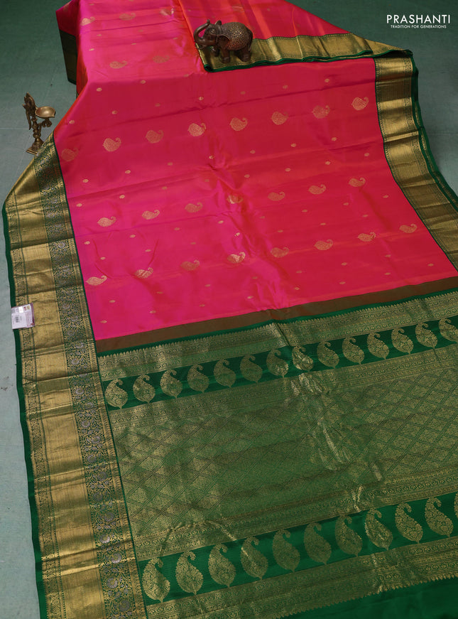 Pure gadwal silk saree dual shade of pink and green with zari woven buttas and rich zari woven border