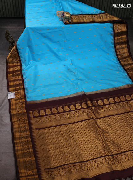 Pure gadwal silk saree light blue and coffee brown with zari woven buttas and temple design zari woven border