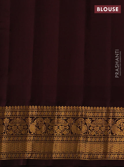 Pure gadwal silk saree light blue and coffee brown with zari woven buttas and temple design zari woven border